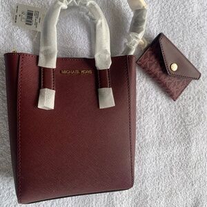 Micheal Kors Hand Bag. Color- Oxblood.